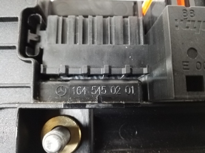  Fuse block holder under the hood 