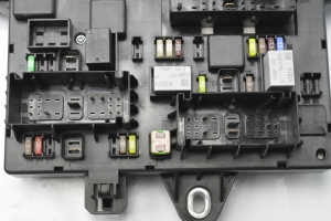  Fuse block holder under the hood 